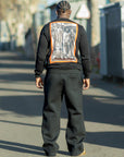 Sweat-shirt noir imprimé Underground porté par un mannequin – vue 6
