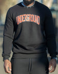 Sweat-shirt noir Underground, col rond et bordures ajustées, porté par un mannequin – vue 3
