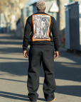 Sweat-shirt noir imprimé Underground Khryzmaparise, look streetwear en extérieur – vue 2
